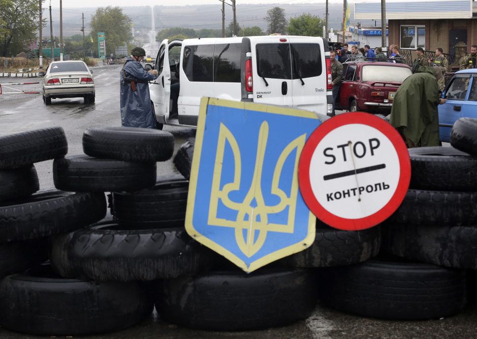 Ukraina: P. Porošenko ir A. Merkel smerkia separatistų rengiamus rinkimus