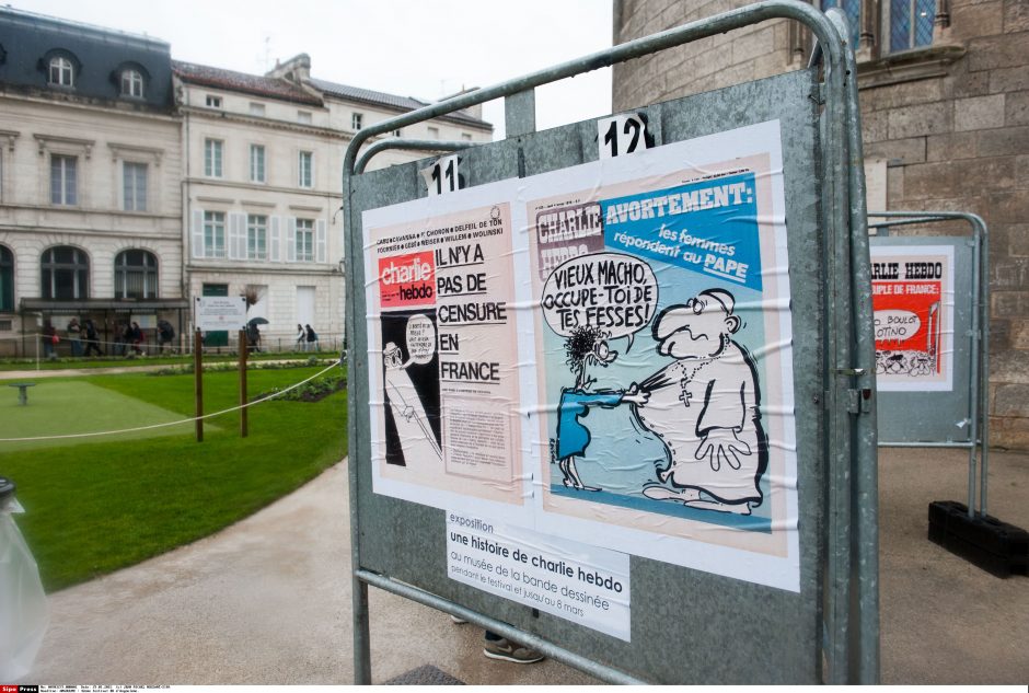 Maskva piktinasi pasibjaurėtina „Charlie Hebdo“ karikatūra apie Ukrainos konfliktą