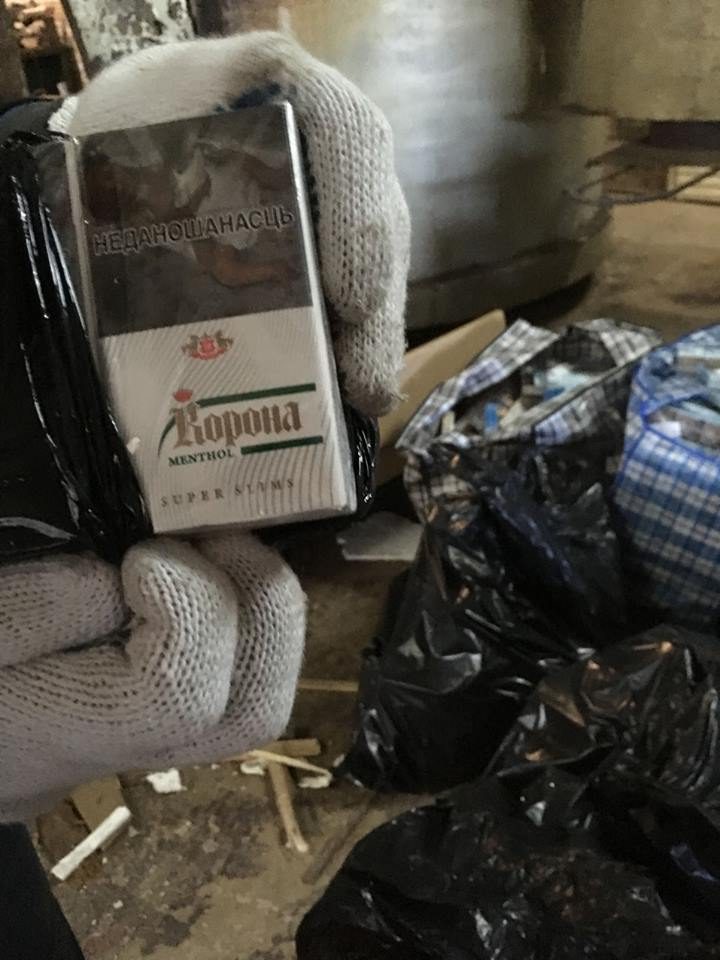 Lazdijų rajone rastas kontrabandinių cigarečių sandėlis