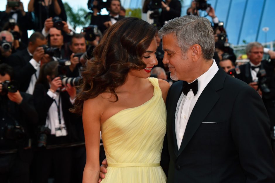 Tėvu tapsiantis G. Clooney nebevažinės į karo zonas