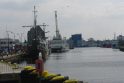 Vieta: Kolobžego uostas su istorinių laivų krantine kairėje ir žvejybos laivais tolesnėje perspektyvoje.