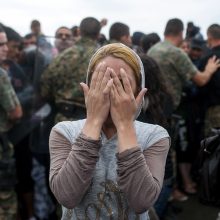 Graikijos krantus pasiekę pabėgėliai skandavo „Europa!“ ir bučiavo smėlį