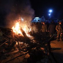 Ukrainoje protestuotojai susirėmė su policija dėl evakuotųjų iš Kinijos