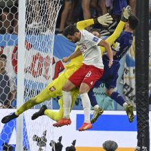 Lenkijos futbolininkus nugalėjusi Argentina triumfavo C grupėje 
