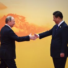 V. Putino galantiškumas užgožė Kinijos prezidentą