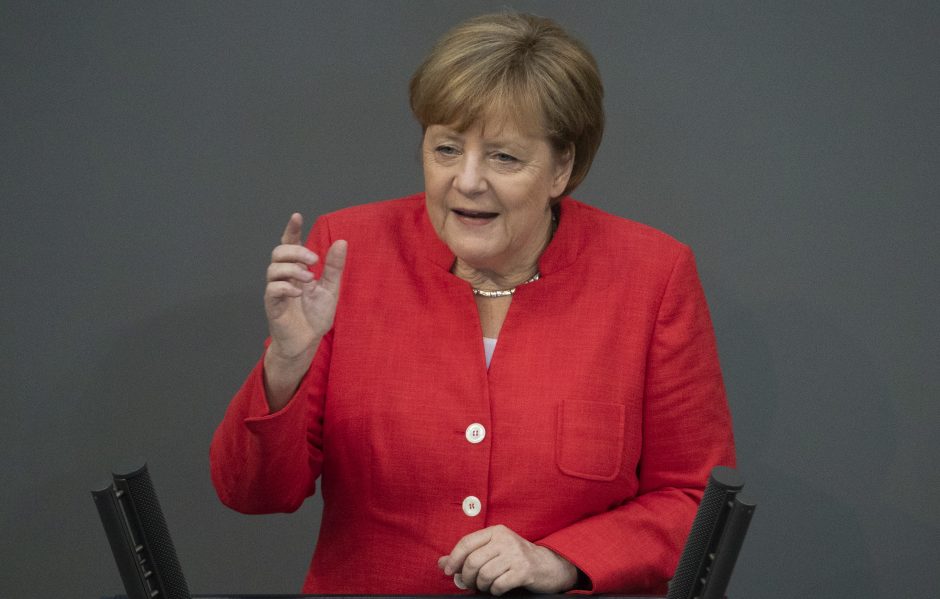 A. Merkel: JAV taikomi muitai turi prekybos karo požymių