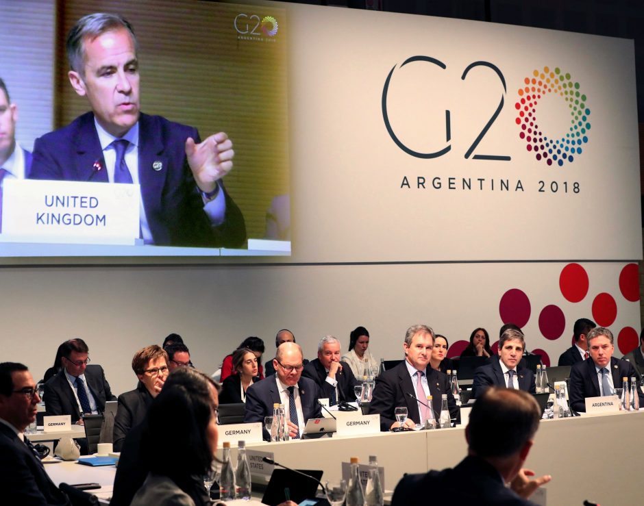G20: išaugusi įtampa dėl prekybos ir geopolitikos kelia grėsmę ekonomikos plėtrai