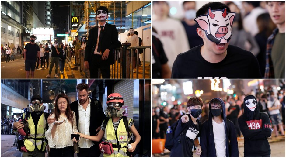 Honkongo protestuotojai nepaiso taisyklių: veidus dengia kaukėmis, vyksta susirėmimai