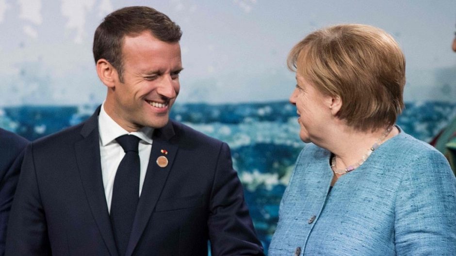 Nesutarimai dėl migrantų temdys E. Macrono ir A. Merkel derybas dėl ES ateities