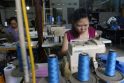 Bangladeše tekstilės įmonės vėl dirba po tragiškos fabriko griūties