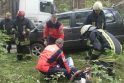 Nemenčinės pl. gelbėtojai iš sumaitoto automobilio išvadavo du vyriškius