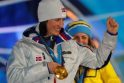 Olimpinėse slidinėjimo varžybose dominuoja norvegė M.Bjoergen
